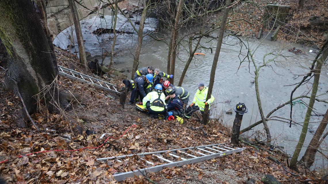 Firefighters rescue a 60-year-old woman who was stuck in an embankment.