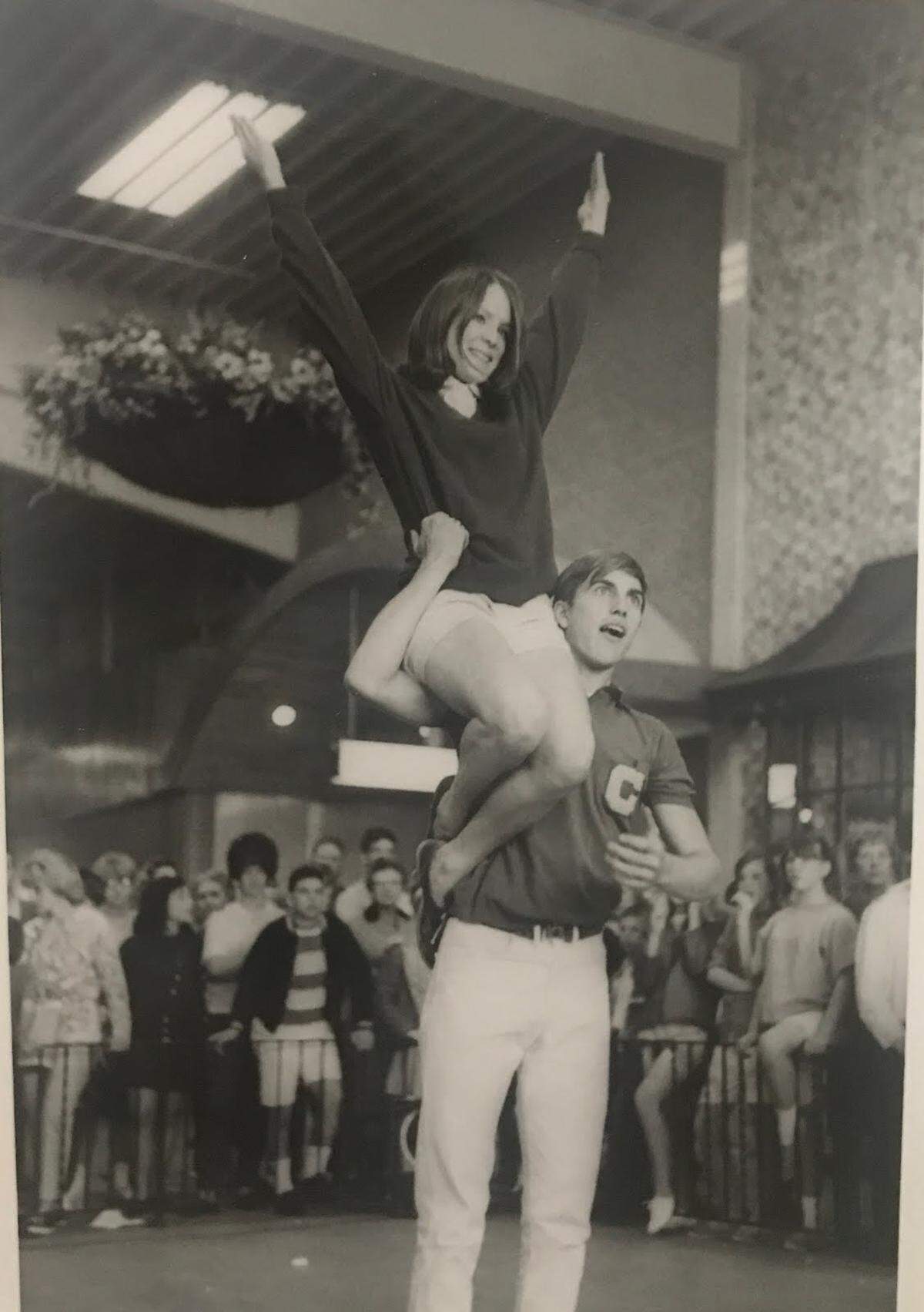 Larry Euston, a KC Chiefs cheerleader at Super Bowl I in 1967, helps with squad tryouts held at Ward Parkway shopping center.