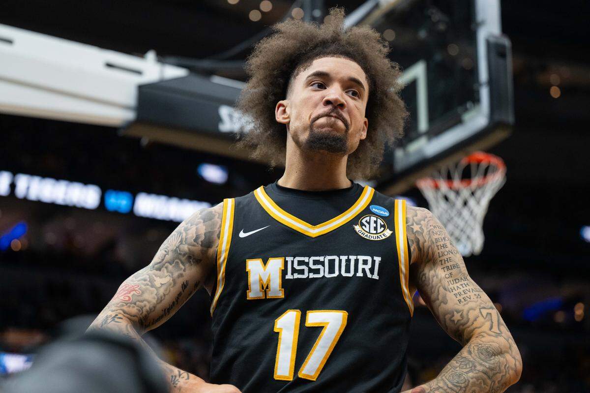 Missouri Tigers guard Jayden Stone (17) flexes after a layup and a foul in the second half of the Tigers first-round NCAA Tournament matchup vs. the Miami Hurricanes at Enterprise Center in St. Louis on Friday, March 20, 2026.
