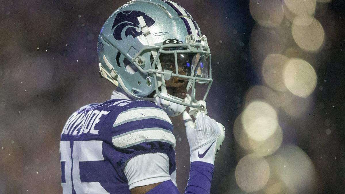 K-State cornerback Ekow Boye-Doe (25) looks at the sideline as rain falls at Bill Snyder Family Stadium during the first quarter of the Sunflower Showdown against Kansas on Nov. 26, 2022.