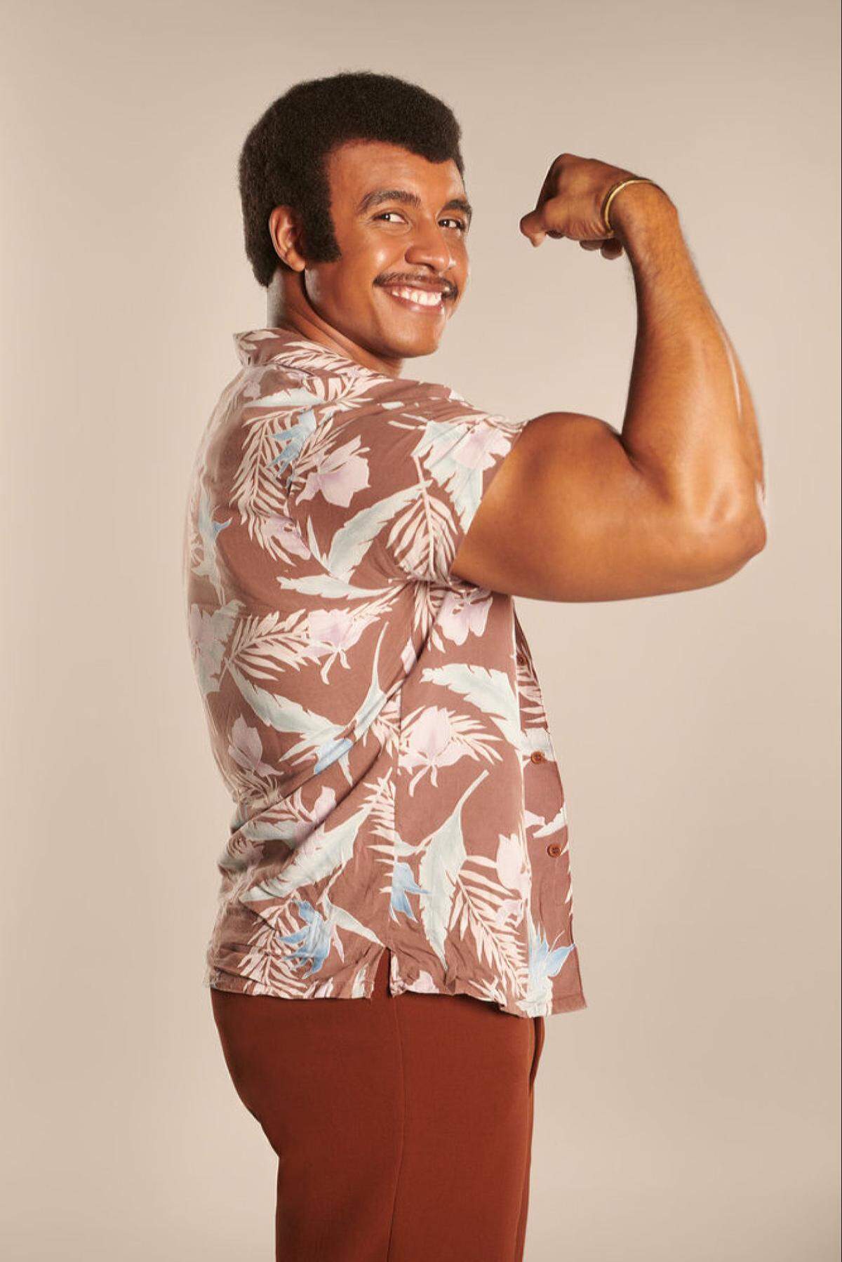Joseph Lee Anderson says he worked with a trainer to pack on 50 pounds of muscle so he could portray Dwayne Johnson’s dad.