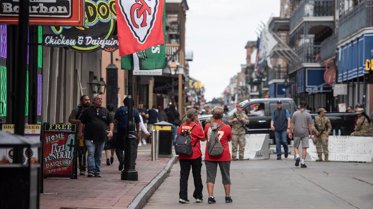 Chiefs fans walk along Bourbon Street in New Orleans on Wednesday, Feb. 7.