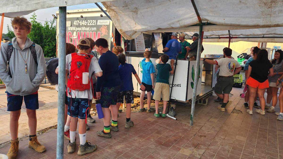 A group of customers standing in line for ice cream at The Iconium General Store.