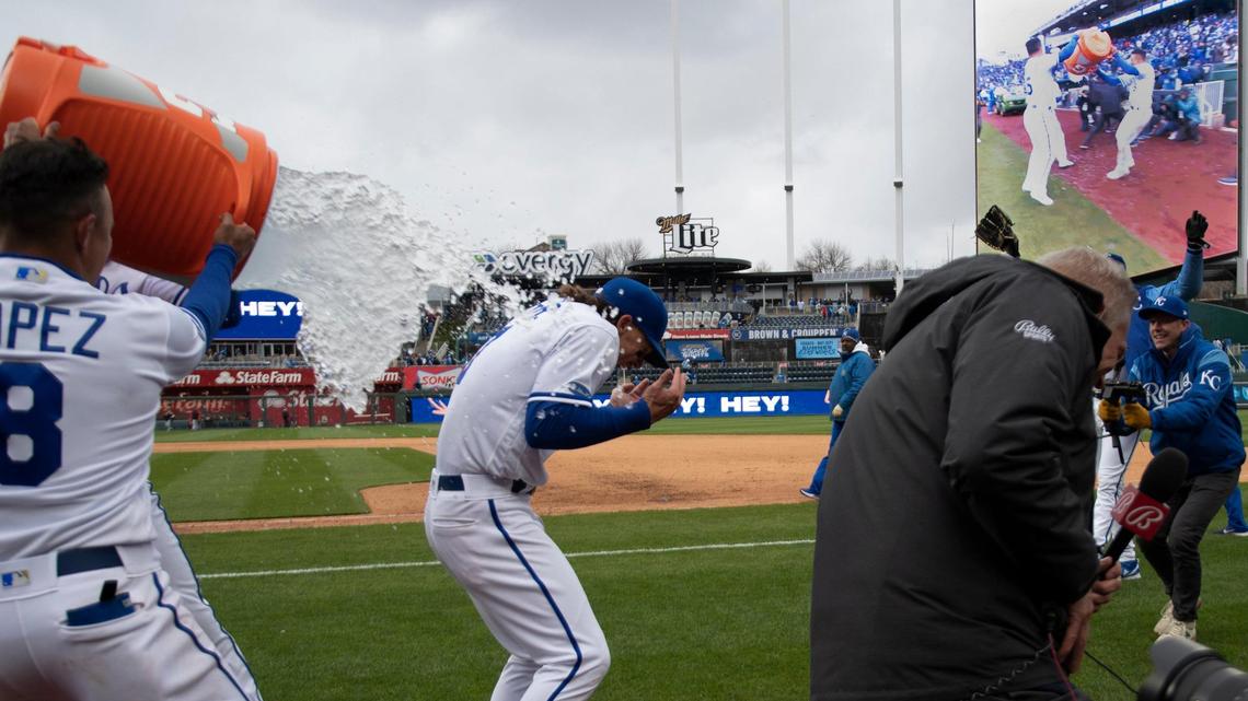 Royals Whit Merrifield (not seen) and infielder Nicky Lopez, left, iced infielder Bobby Witt Jr. during his postgame interview with Joel Goldberg. Witt in his MLB debut, knock in the game winning run as the Royals defeated the Cleveland Guardians, 3-1, in the season opener Thursday, April 7, 2022, at Kauffman Stadium in Kansas City.