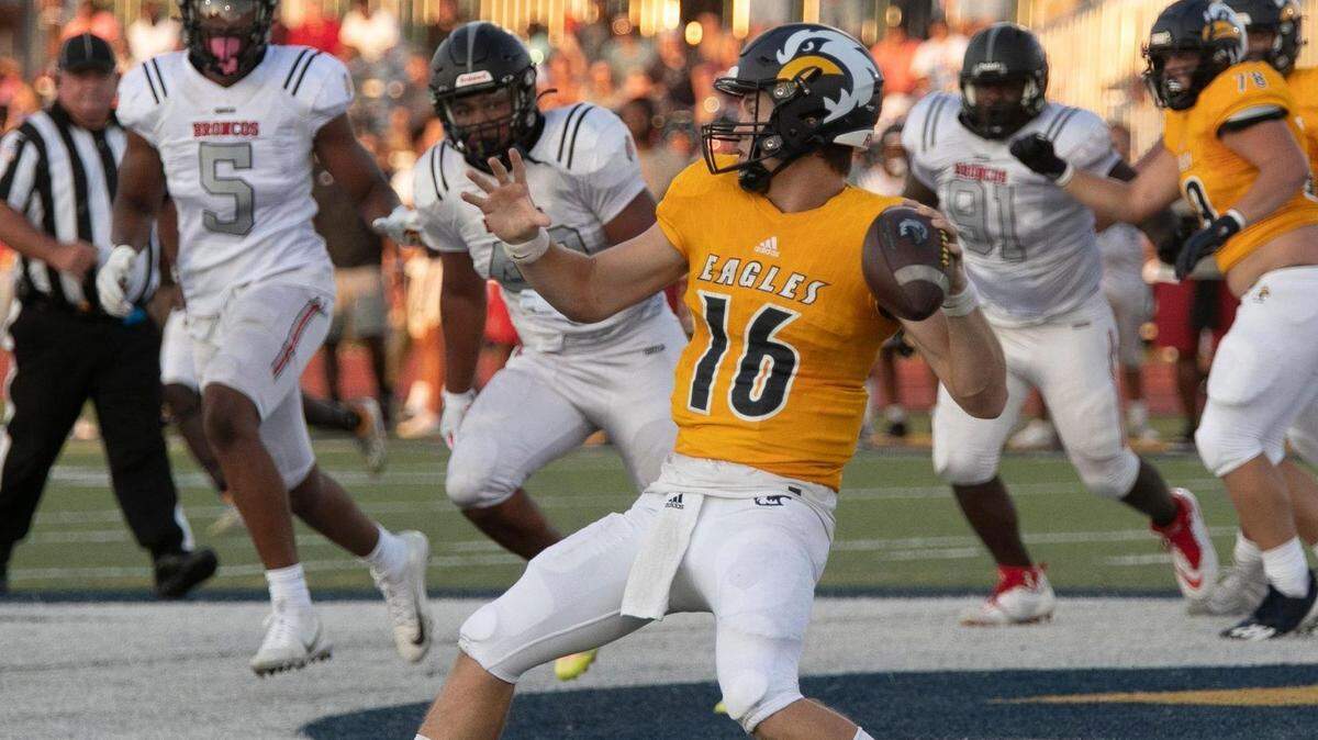 Liberty North quarterback Sam Van Dyne looks for an open receiver during last week’s season opener against Lee’s Summit North in Liberty.