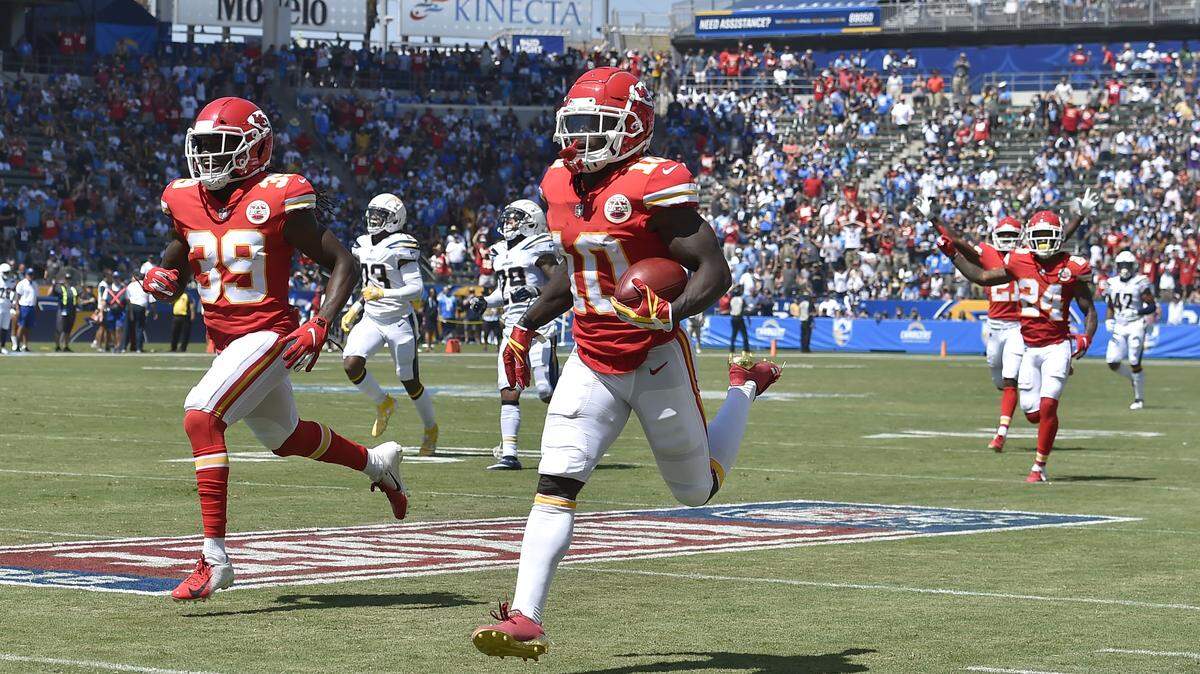 Chiefs wide receiver Tyreek Hill ran back a punt return for a touchdown in the first quarter against the Chargers during Sunday’s football game in Carson, Calif.