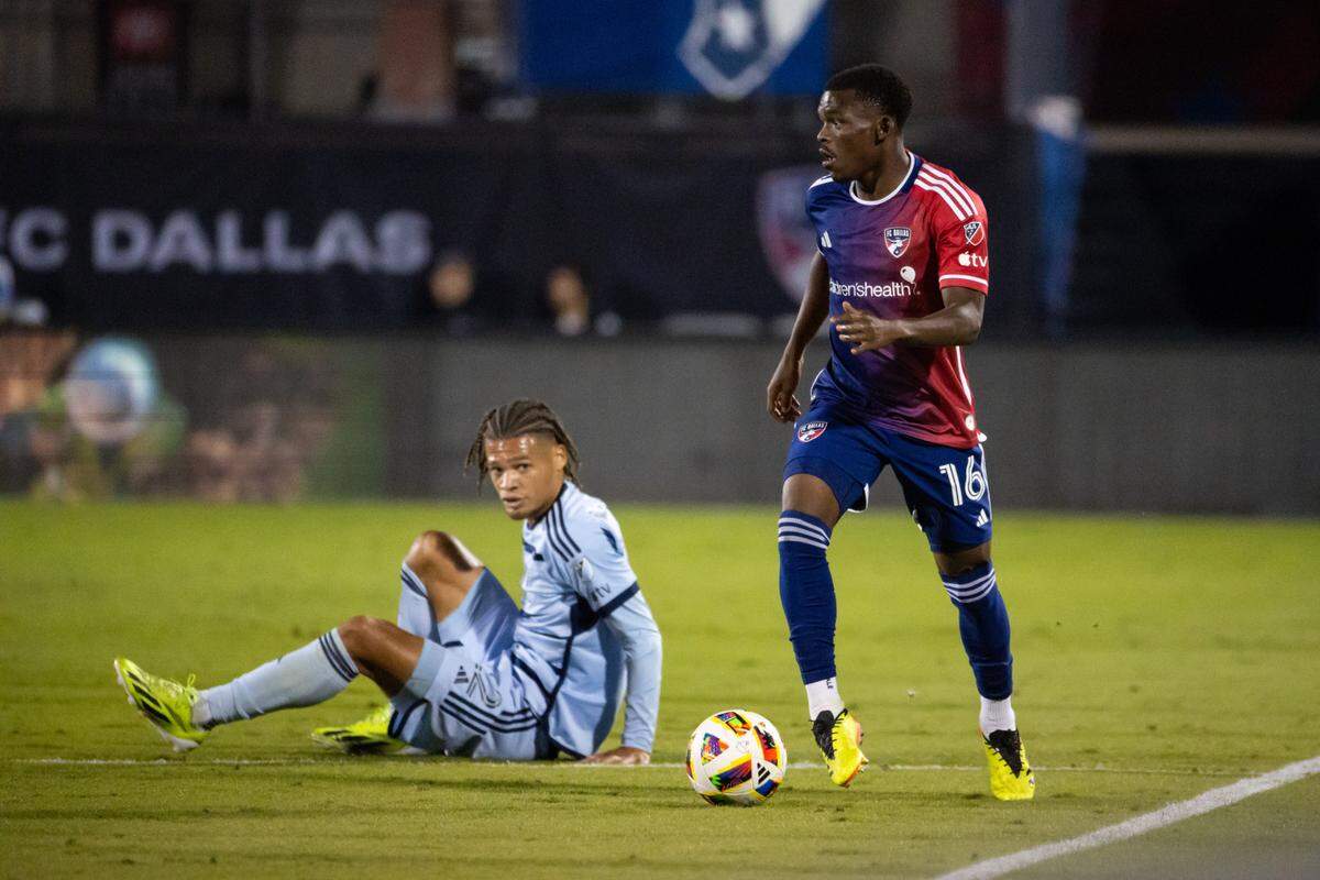 FC Dallas midfielder Katlego Ntsabeleng (16) controls the ball along the boundary line at Toyota Stadium on Oct. 19, 2024.