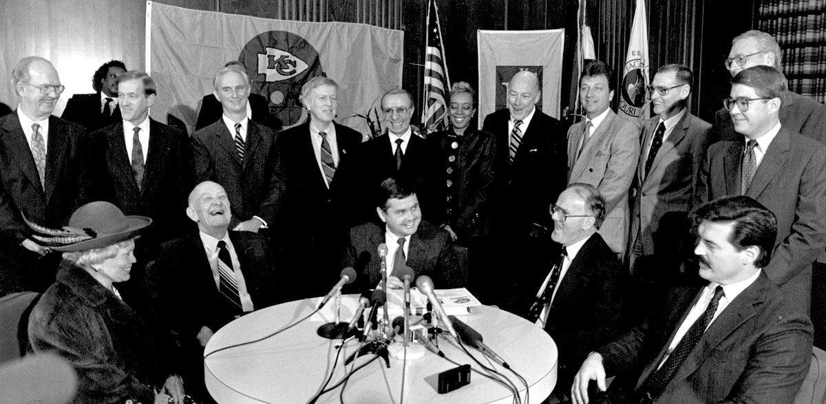Jackson County Executive bill Waris, center, and Sports Authority Chairman ***** Condon, right, today signed new leases for the sports complex stadiums. Also at the table were Royals co-owner Ewing M. Kauffman and his wife, Muriel, left, and Chiefs owner Lamar Hunt.