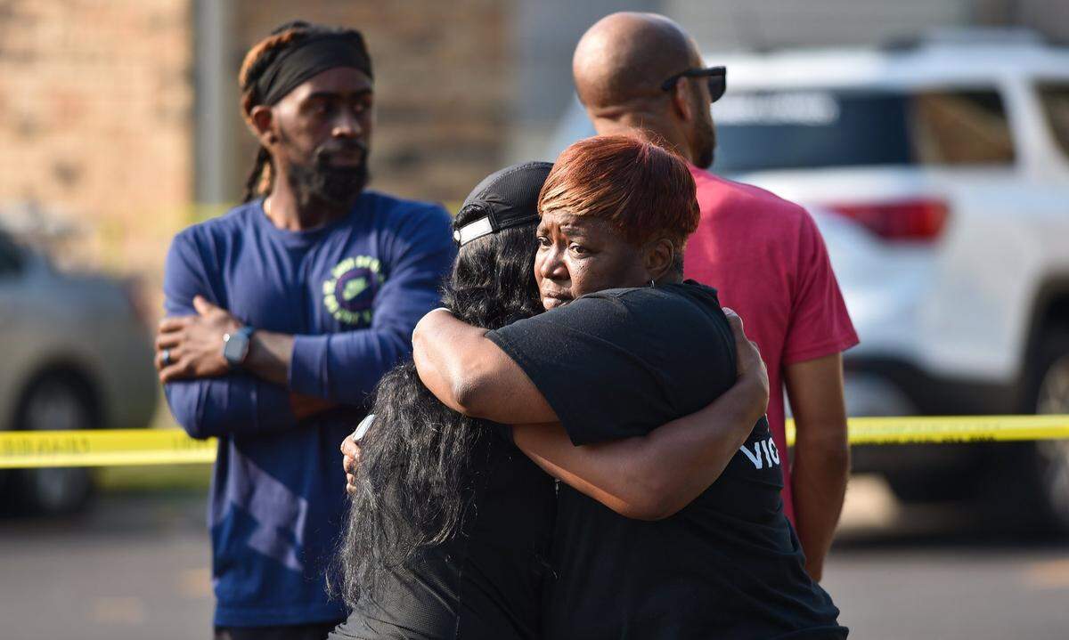 A man and a woman were found dead inside a unit in the Citadel Apartments in the 1600 block of Citadel Drive Monday morning, Aug. 2, 2021. Police say they found the victims shot and unresponsive. Rosilyn Temple with Kansas City Mothers in Charge comforted family and friends at the scene.