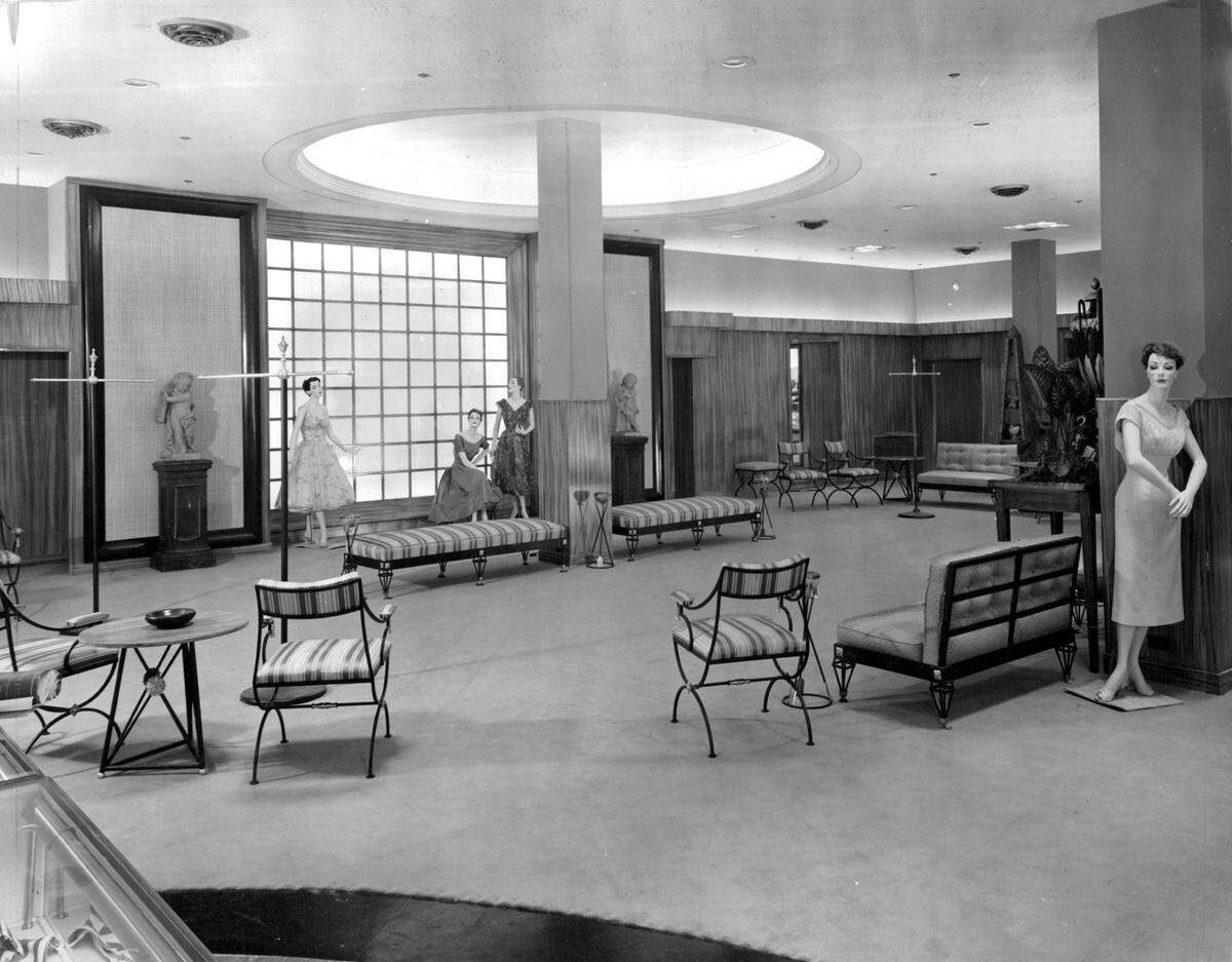 The new Harzfeld’s store on the Country Club Plaza featured furniture in this circa 1960s photo. A preview showing of the store drew about 500 attendees from local merchant associations, press, and radio, highlighting its elegant design, including antique French statues and concealed lighting.