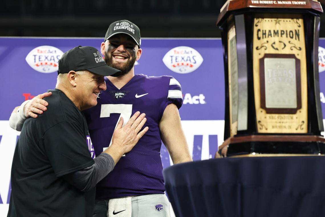 Kansas State Wildcats coach Chris Klieman hugs quarterback Skylar Thompson (7) after defeating the LSU Tigers in the 2022 Texas Bowl at NRG Stadium on Jan. 4, 2022.