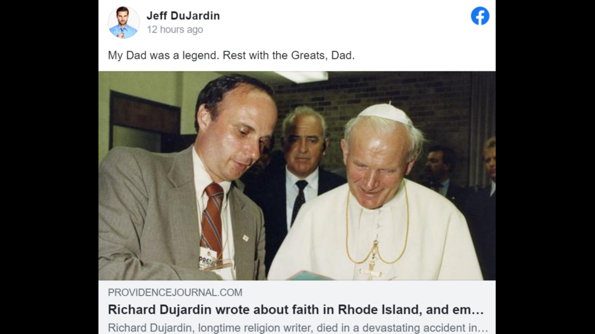 Richard Dujardin is seen sharing greeting cards with Pope John Paul II in this Providence Journal photo. Dujardin died falling from a baybridge while on vacation in Milwaukee.