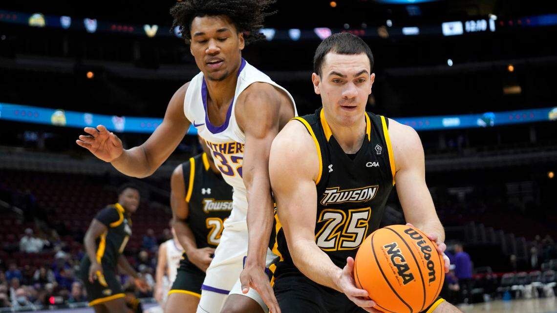 Northern Iowa guard Tytan Anderson defends Towson guard Nicolas Timberlake during the first half at United Center in Chicago on Dec. 17, 2022.