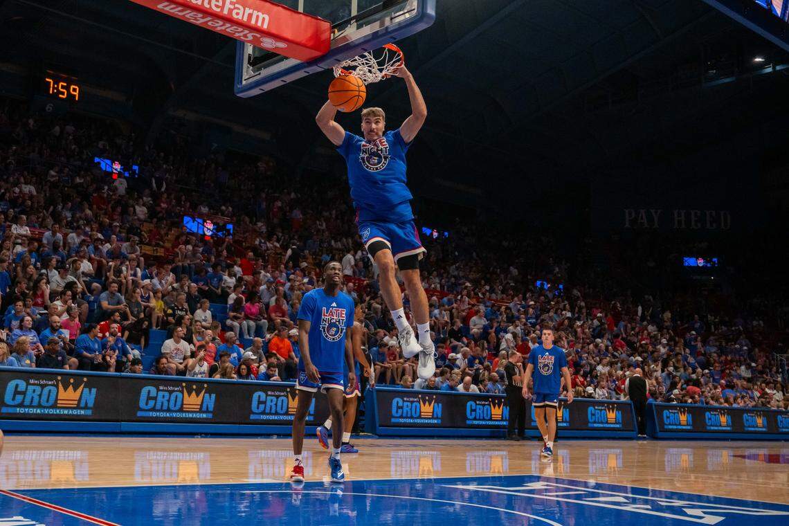 Kansas Jayhawks guard Kohl Rosario dunks the ball prior to the men's scrimmage at Late Night in the Phog, on Friday, October 17, 2025, in Lawrence.