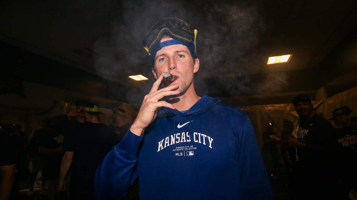 Kansas City Royals pitcher Kyle Wright (30) celebrates after clinching a Wild Card playoff birth after a game against the Atlanta Braves at Truist Park on Sept. 27, 2024.
