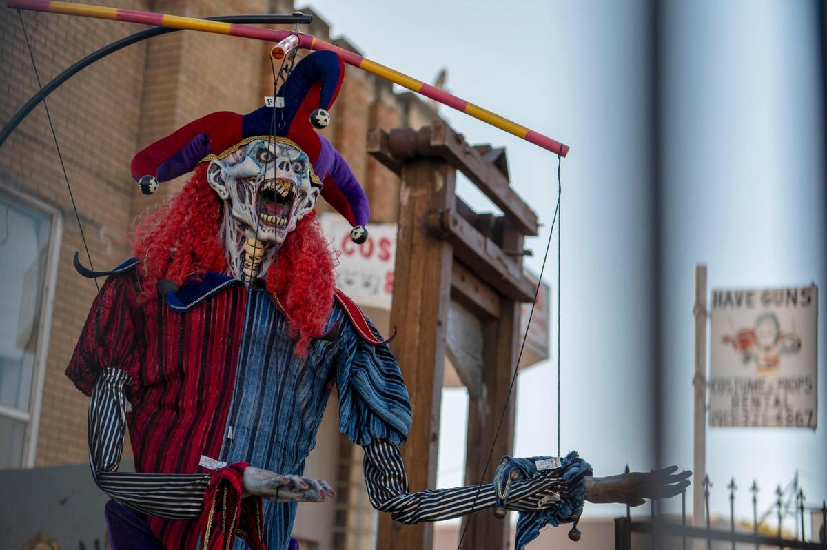 Spooky decorations greet customers at the front entrance of Have Guns Will Rent Costumes and Props.