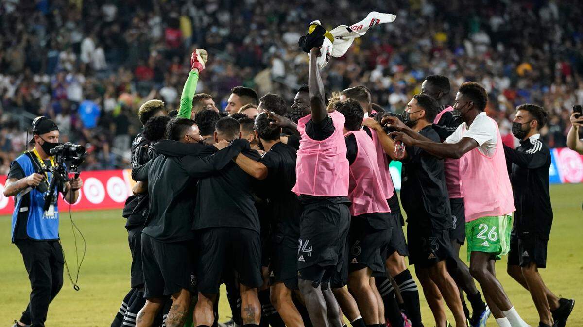 MLS All-Star players celebrate after FC Dallas forward Ricardo Pepi (24) scored the winning goal in a penalty shoot out against the Liga MX All-Stars during the MLS All-Star soccer match Wednesday, Aug. 25, 2021, in Los Angeles. (AP Photo/Ashley Landis)