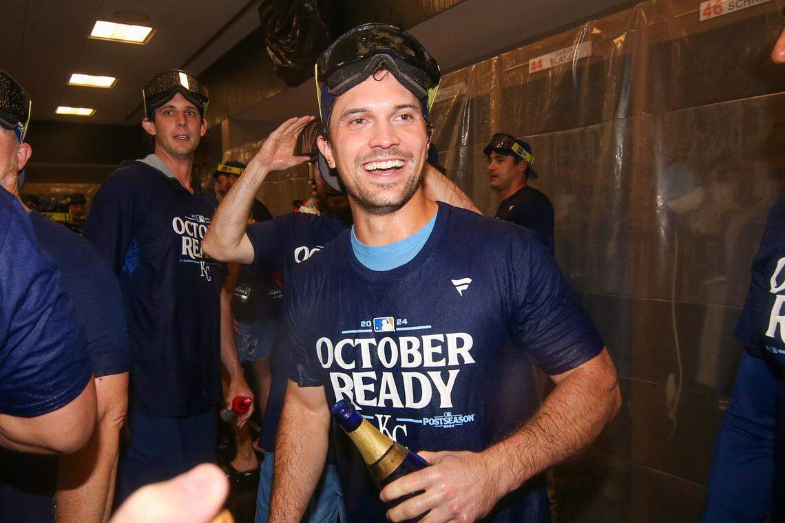 Kansas City Royals second baseman Adam Frazier (26) celebrates after clinching a wild card playoff birth after a game against the Atlanta Braves at Truist Park.