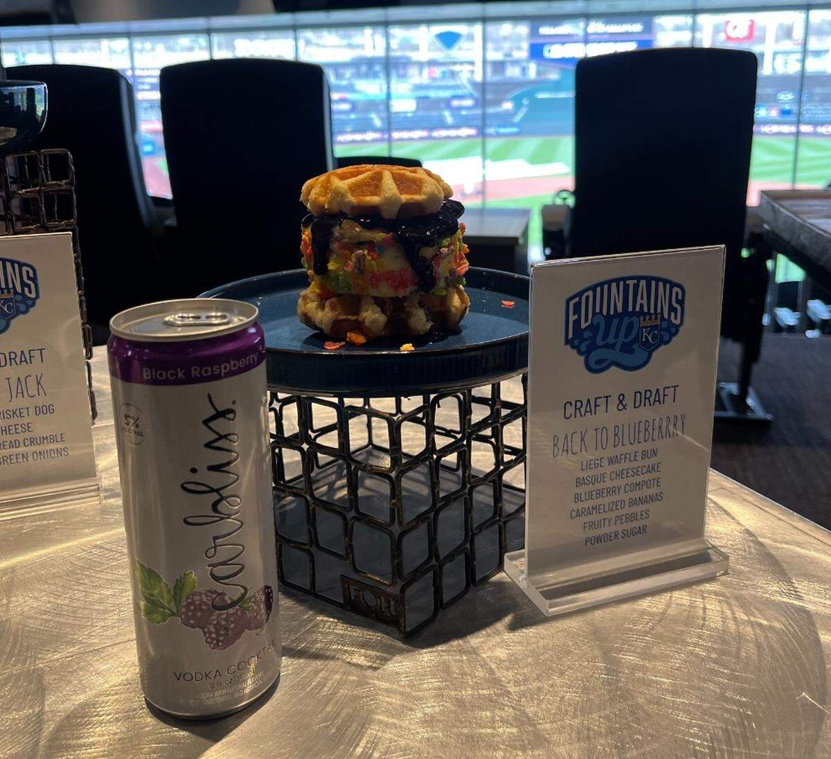 Back to Blueberry, a waffle sandwich with basque cheesecake, blueberry compote, caramelized bananas, Fruity Pebbles and powered sugar. It’s available at Kauffman Stadium for the 2025 MLB season.