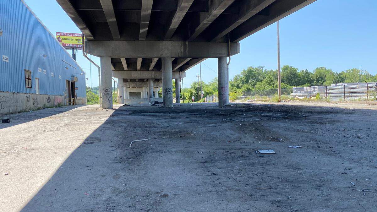 Jackson County cleanup crews have removed an abandoned mobile home destroyed by fire from underneath the 23rd Street bridge over Manchester Trafficway in Kansas City, the county said in a news release.