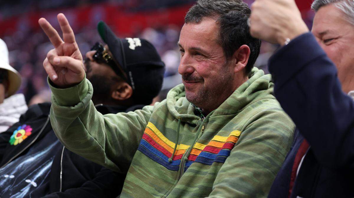Actor Adam Sandler attends the NBA game between the Phoenix Suns and the LA Clippers at Crypto.com Arena.