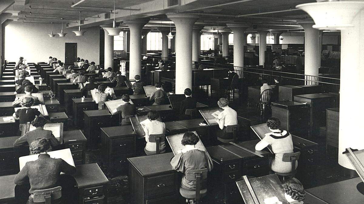 This undated file photo shows artists in one of Hallmark’s early design studios.