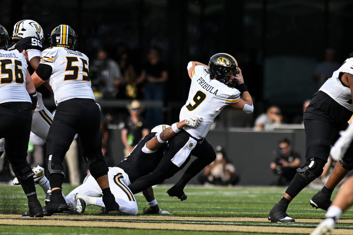 Beau Pribula #9 of the Missouri Tigers runs the ball against the Vanderbilt Commodores in the first half at FirstBank Stadium on October 25, 2025 in Nashville.