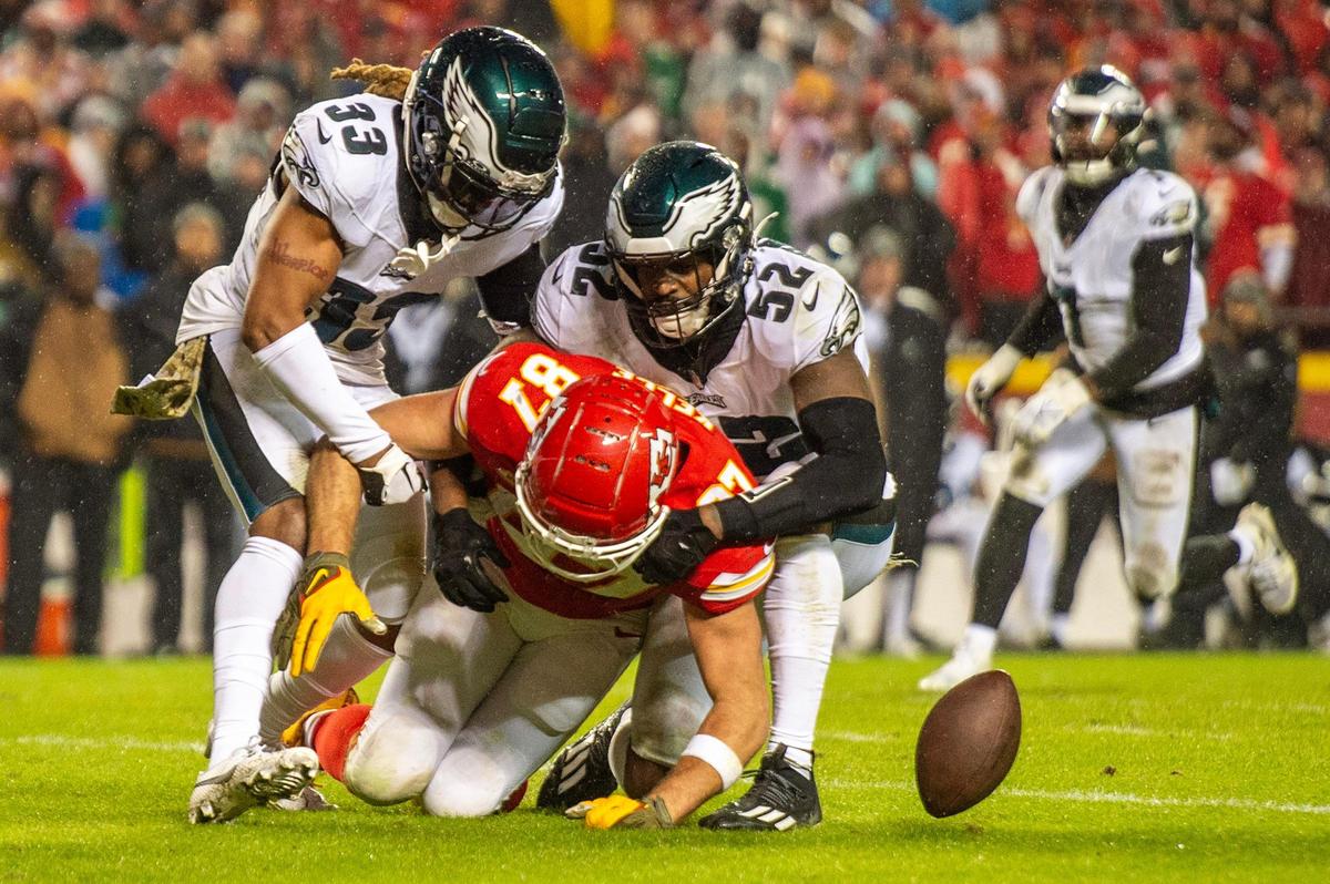 Kansas City Chiefs tight end Travis Kelce (87) fumbles the ball in the fourth quarter during an NFL football game against the Philadelphia Eagles at GEHA Field at Arrowhead Stadium on Monday, Nov. 20, 2023, in Kansas City.