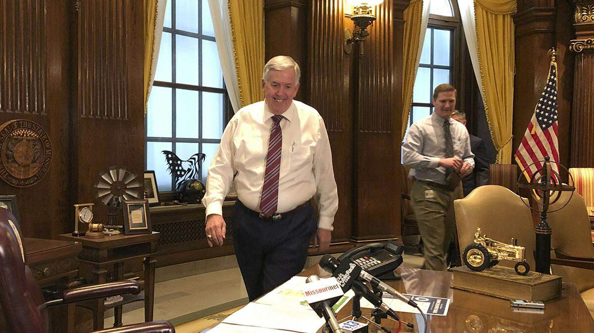 Missouri Gov. Mike Parson arrives for a news conference Tuesday, May 14, 2019, in his Capitol office in Jefferson City, Missouri.