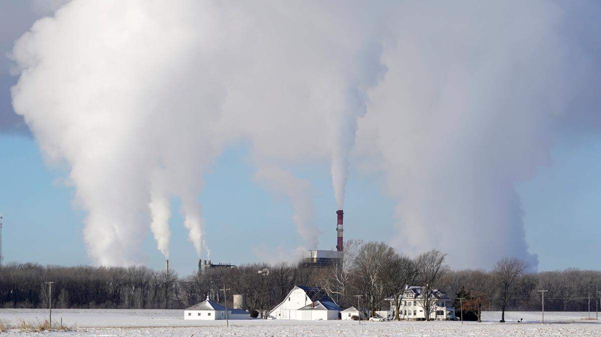 The Lawrence Energy Center produces power Tuesday near Lawrence, Kansas. Rolling blackouts implemented by power companies throughout the Central United States have raised questions about vulnerablities in the way power is generated.