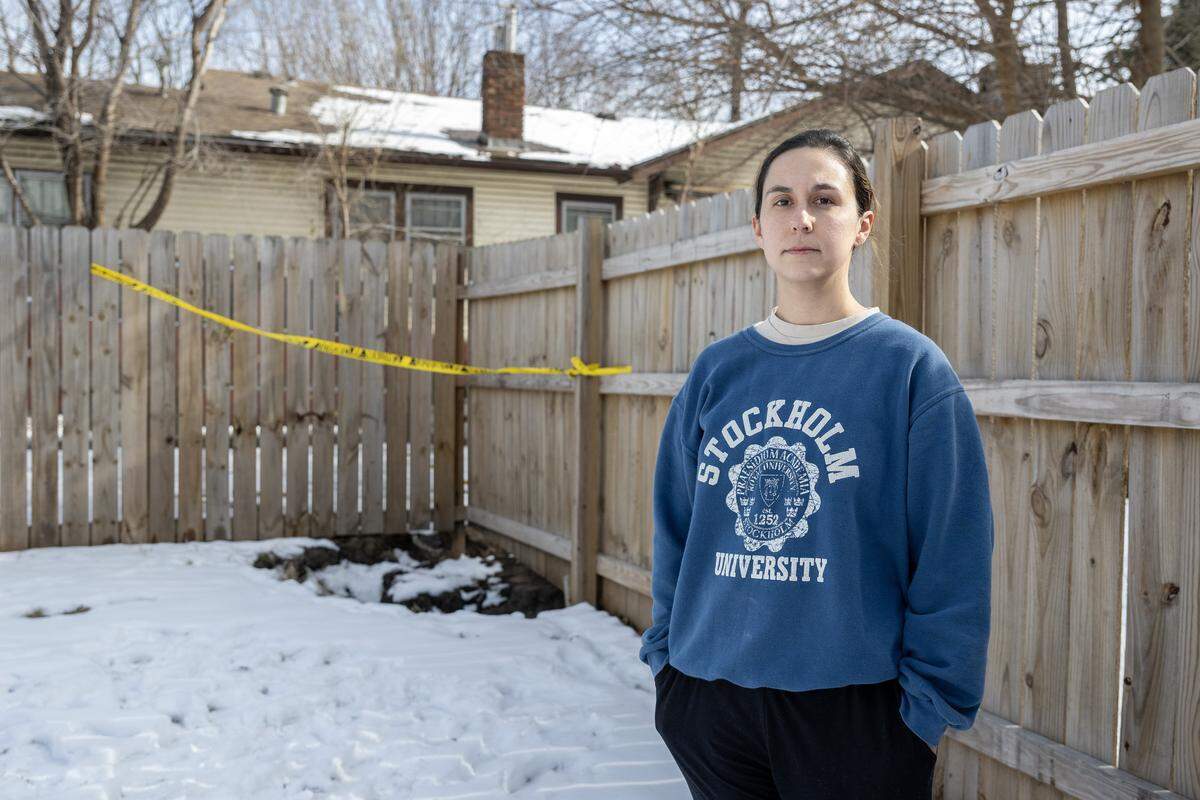 Cassandra Krul stands for a portrait near a sinkhole in her backyard on Monday, Feb. 2, 2026, in Independence.