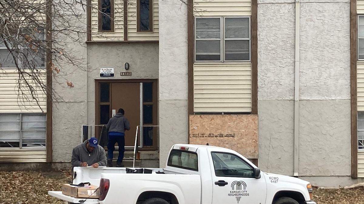 City workers close up the Cloverleaf Apartments in south Kansas City after 76 households were evacuated. The Kansas City Fire Department declared the complex to be unsafe and uninhabitable.
