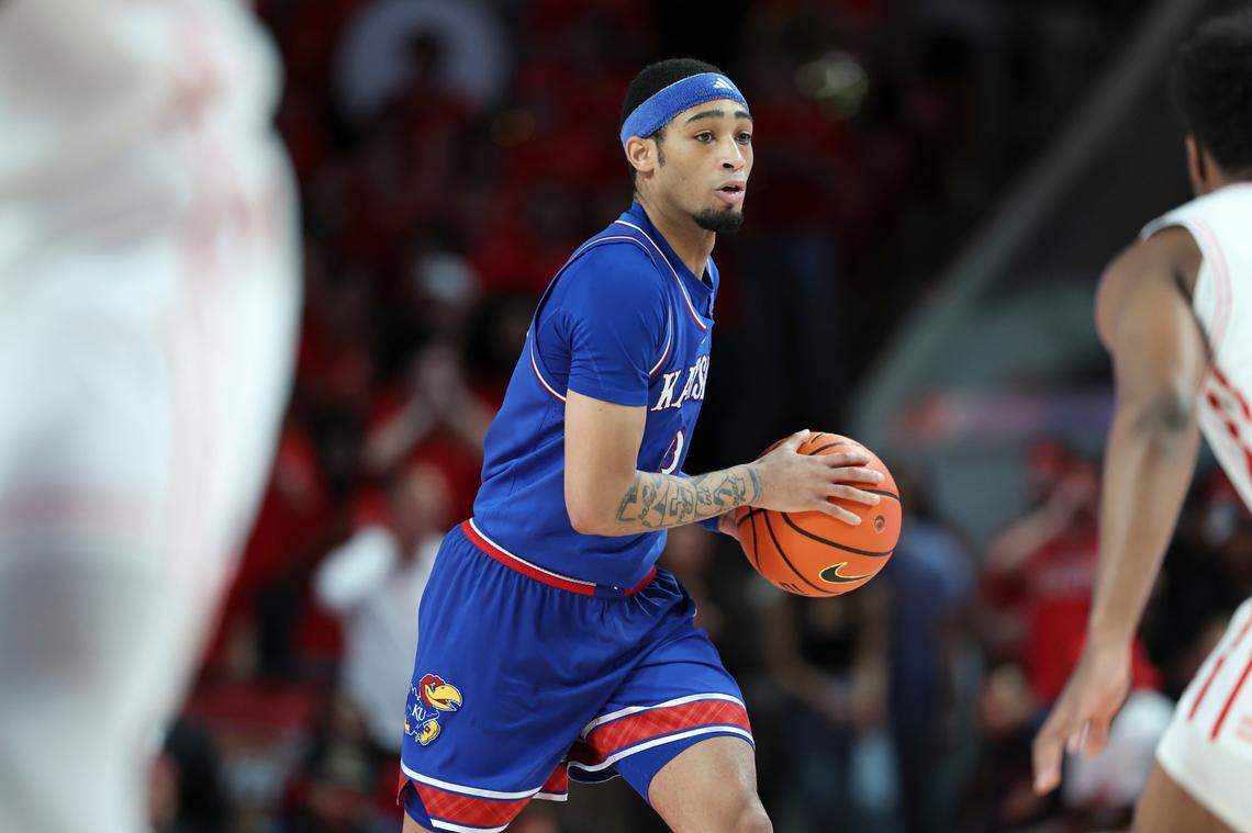 Kansas Jayhawks guard Dajuan Harris Jr. dribbles upcourt during a Big 12 college basketball game against the Houston Cougars at the Fertitta Center in Houston on Monday, March 3, 2025.