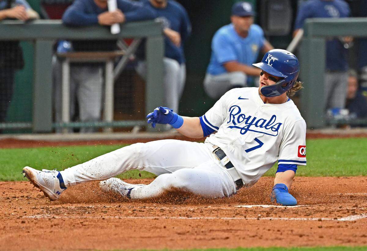 Kansas City Royals shortstop Bobby Witt Jr. slides and scores during the third inning of Wednesday evening’s game against the Tampa Bay Rays at Kauffman Stadium.