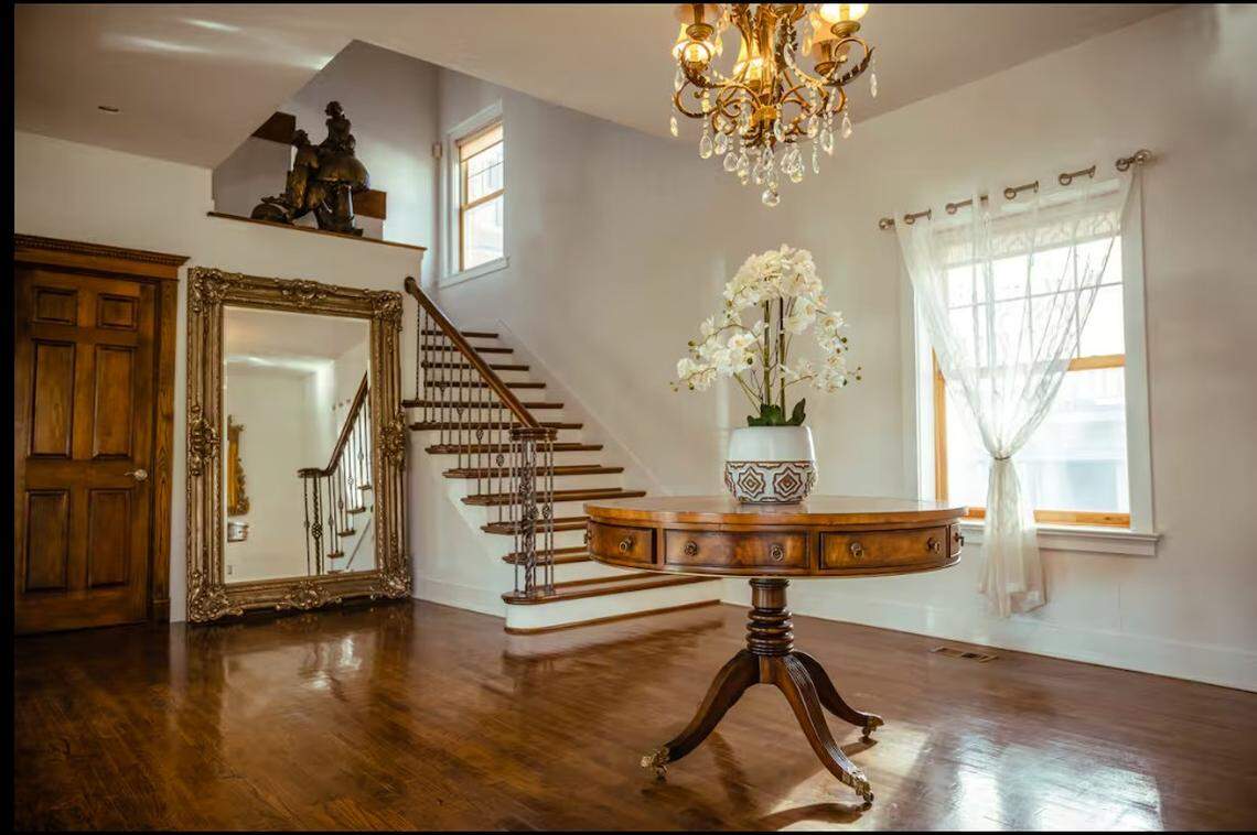 Inside the Warwick Mansion listing on Airbnb