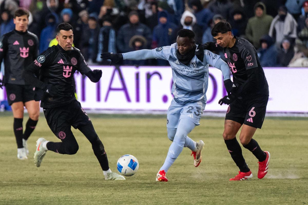 Sporting KC forward William Agada sprints with the ball between two Inter Miami defenders in the second half of the Concacaf Champions Cup match of Sporting KC vs. Inter Miami CF on Wednesday, Feb. 19, 2025, at Sporting Park.