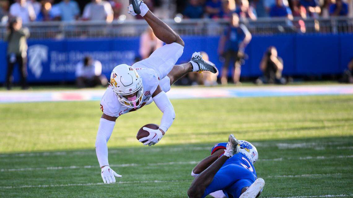 Kansas defensive back Cobee Bryant (below) upended Iowa State star wide receiver Xavier Hutchinson during the second half on Saturday, Oct. 1, 2022, in Lawrence. KU won 14-11.