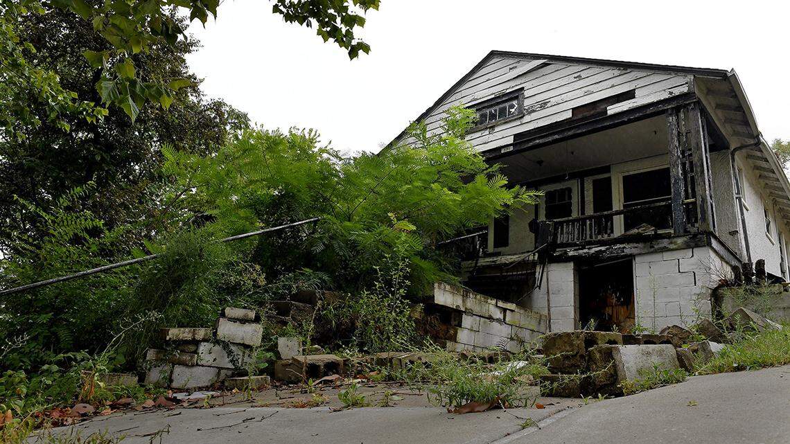 The Land Bank, created to manage abandoned properties, faces criticism for inefficiency and a lack of transparency.