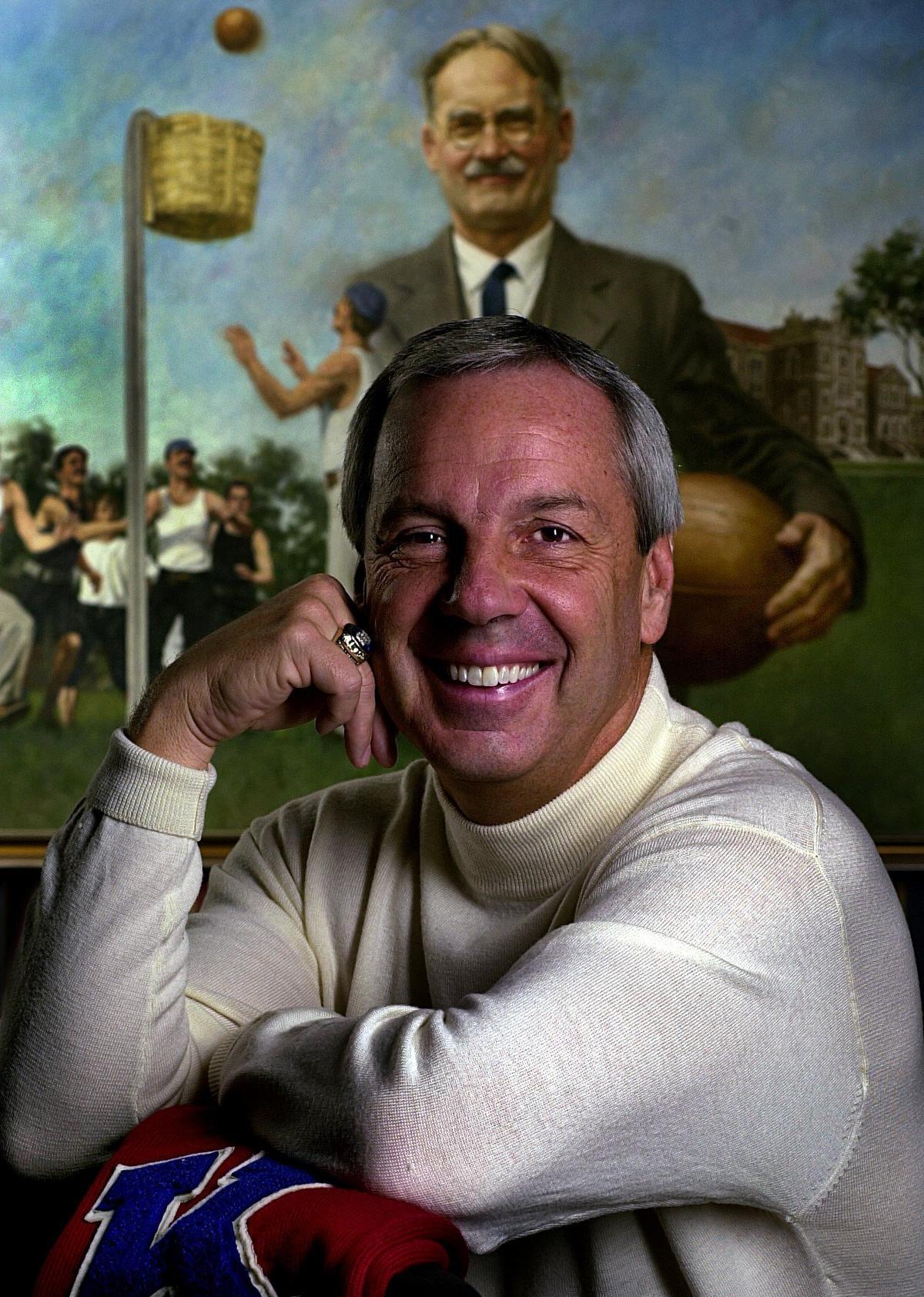 Roy Williams pose for a portrait in 2000 after he chose to stay at KU and continue a legacy that began with James Naismith. His love of both KU and North Carolina made it a difficult decision.