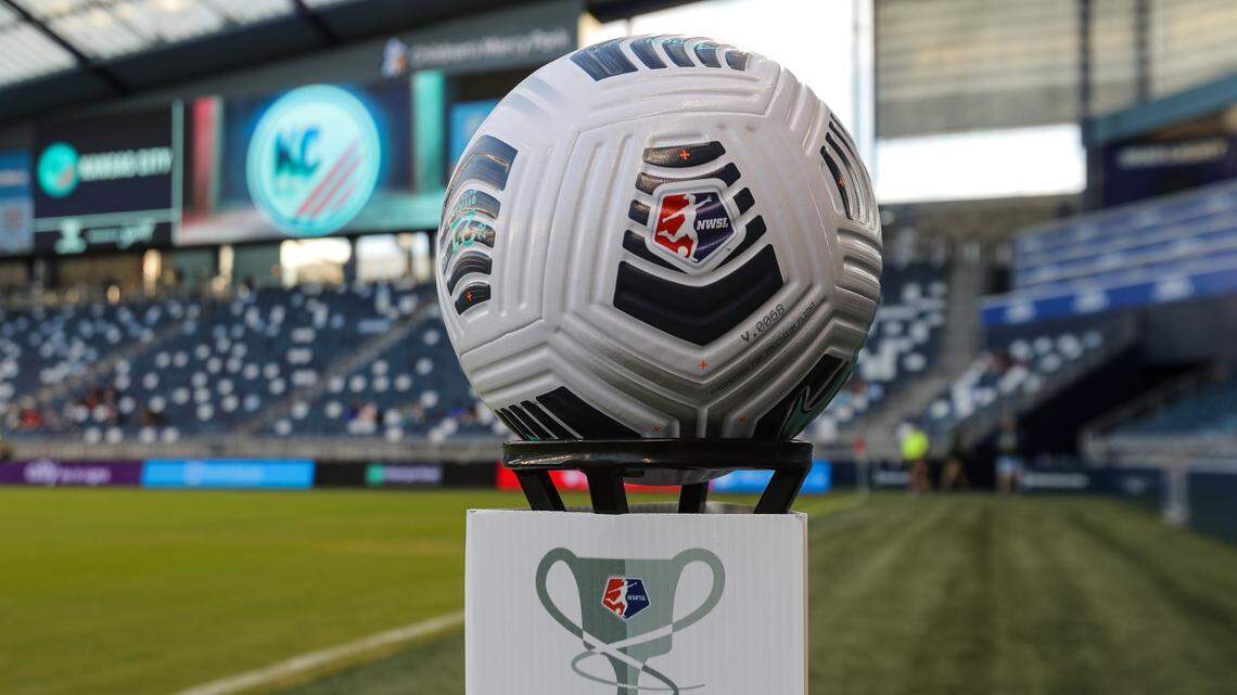 The National Women’s Soccer League ball rests on a Challenge Cup stand near the sideline before the Kansas City NWSL home opener earlier this season.