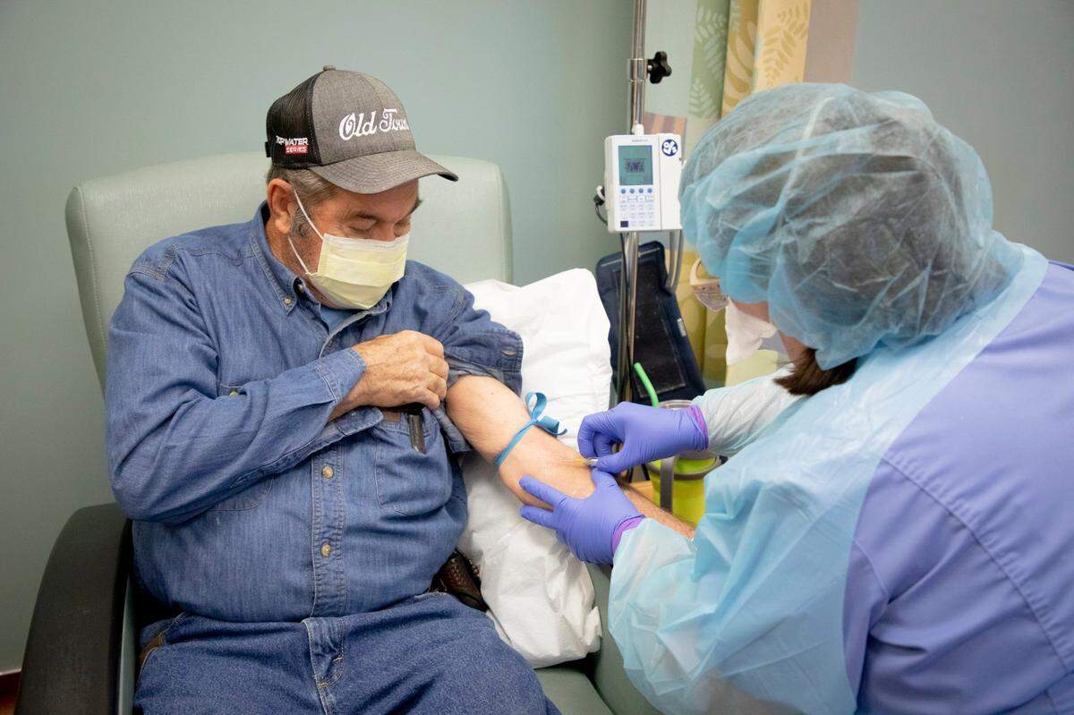 Earlier this year in North Carolina, registered nurse Betsy Chapman prepared Tony Isley to receive an infusion of monoclonal antibodies, a treatment authorized by the FDA that studies suggest could prevent some people infected with COVID-19 from needing to be hospitalized.