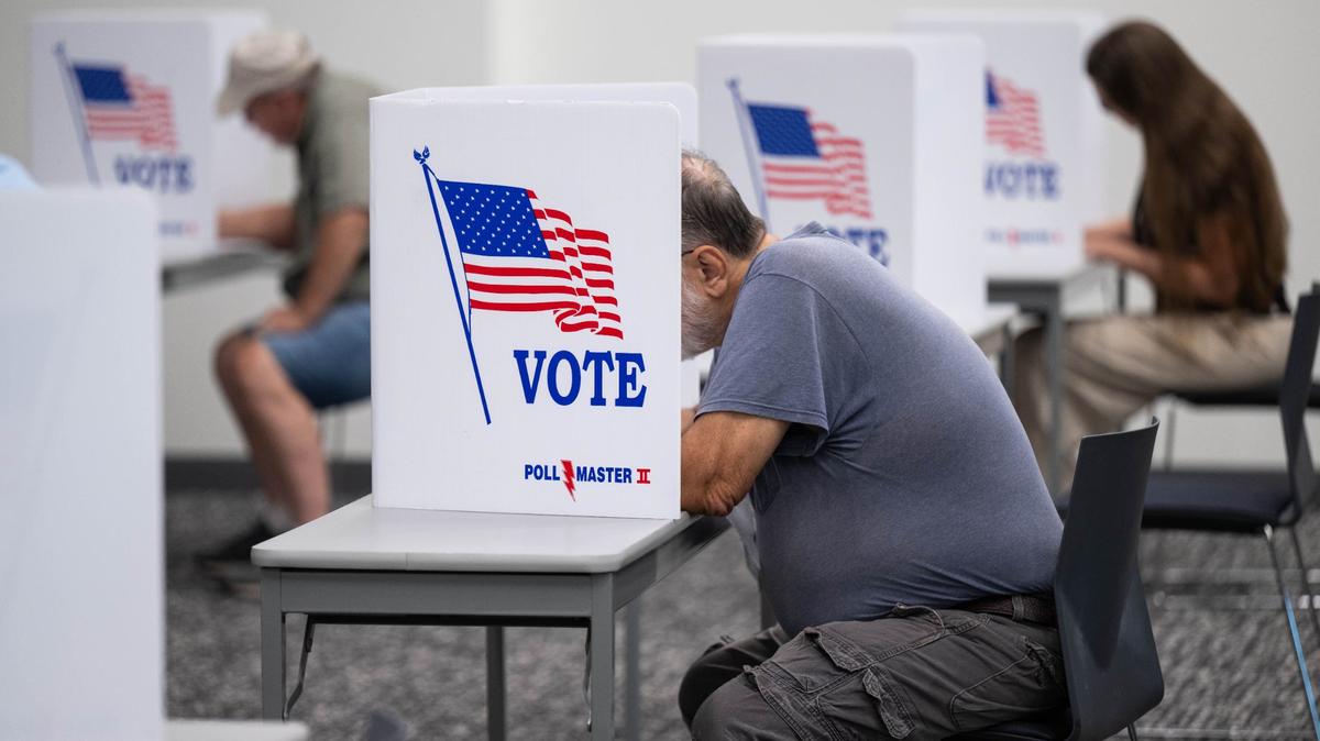 Voters cast ballots for the Missouri primary election at the Midwest Genealogy Center on Tuesday, Aug. 6, 2024, in Independence.