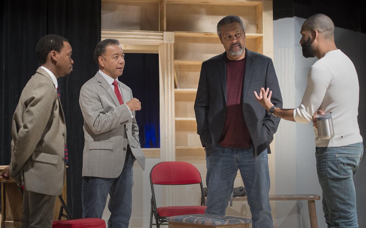 In 2018, Walter Coppage, second from left, played Morehouse College President Benjamin Mays in The Coterie production of “Becoming Martin.” He rehearsed with, from left, Aaron Ellis, who played a young Martin Luther King Jr., Oscar-winning writer Kevin Willmott and  director Chip Miller.