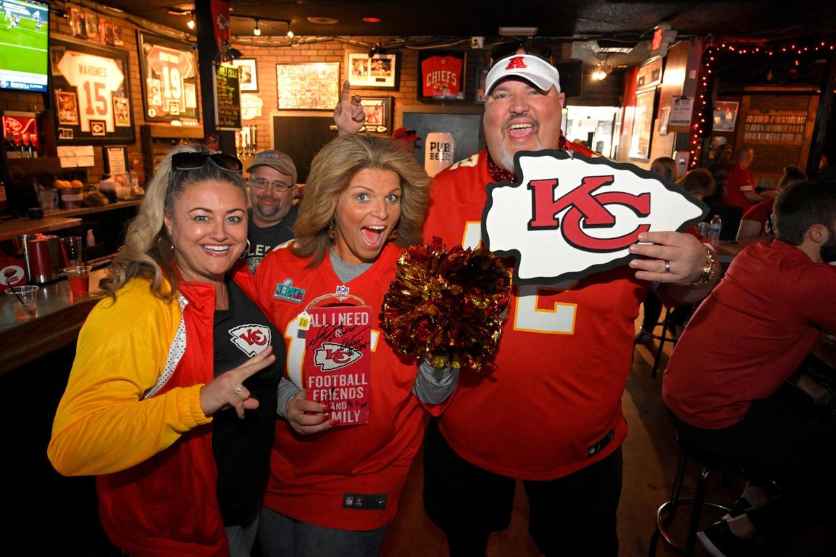 Kansas City Chiefs fans Mimi Rubio, from left, of Kansas City, Kimberly and Steve Kennedy, celebrated all-things Chiefs Wednesday, Feb. 8, 2023 at Pub Rock Live, a Chiefs bar in Scottsdale, Arizona. Kimberly Kennedy was also revealing in the fact that she just purchased two tickets, at $7,400 each, for Super Bowl LVII on Sunday. Kimberly is formerly of Gladstone and her husband, Steve, is from Independence, Missouri. The couple now live in Gilbert, Arizona.