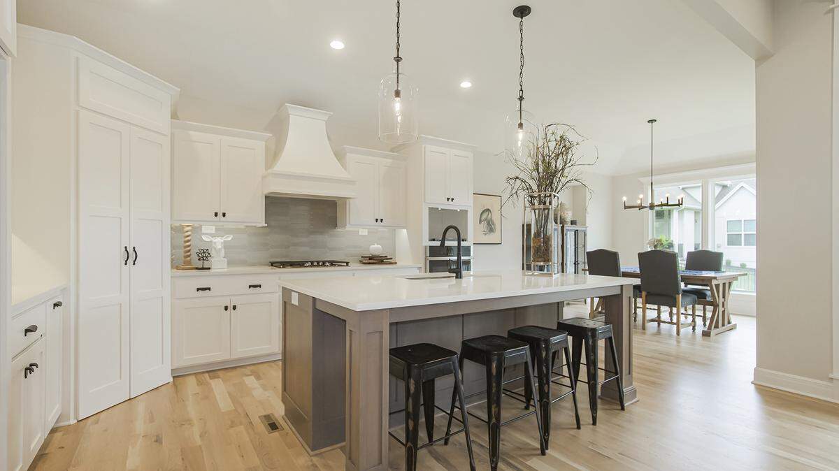 Rodrock’s Riverstone offers 4 move-in ready homes, including the Augusta Reverse. Perfectly situated on a quiet cul-de-sac, this home stands out with a hard-to-find plan that includes 3 bedrooms on the main floor. From its inspiring foyer with 11-foot, vaulted ceilings to the Great Room with see-through fireplace onto the covered patio, the Augusta Reverse impresses at every turn. Ideally situated at 183rd and Caenen (one street west of Quivira), Riverstone offers quiet country feel and city proximity.