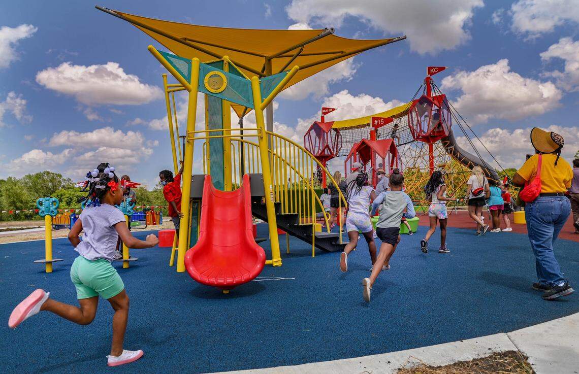 Kids ran to the playground after Kansas City Parks and Recreation opened the 15 and the Mahomies Playground at Martin Luther King, Jr. Park on Saturday, Aug. 28, 2021, at Dr. Martin Luther King, Jr. Blvd. & Woodland Ave., in Kansas City. Chiefs quarterback’s Patrick Mahomes foundation, 15 and the Mahomies Foundation donated $1 million to help transform the park making it accessible for children of all abilities.