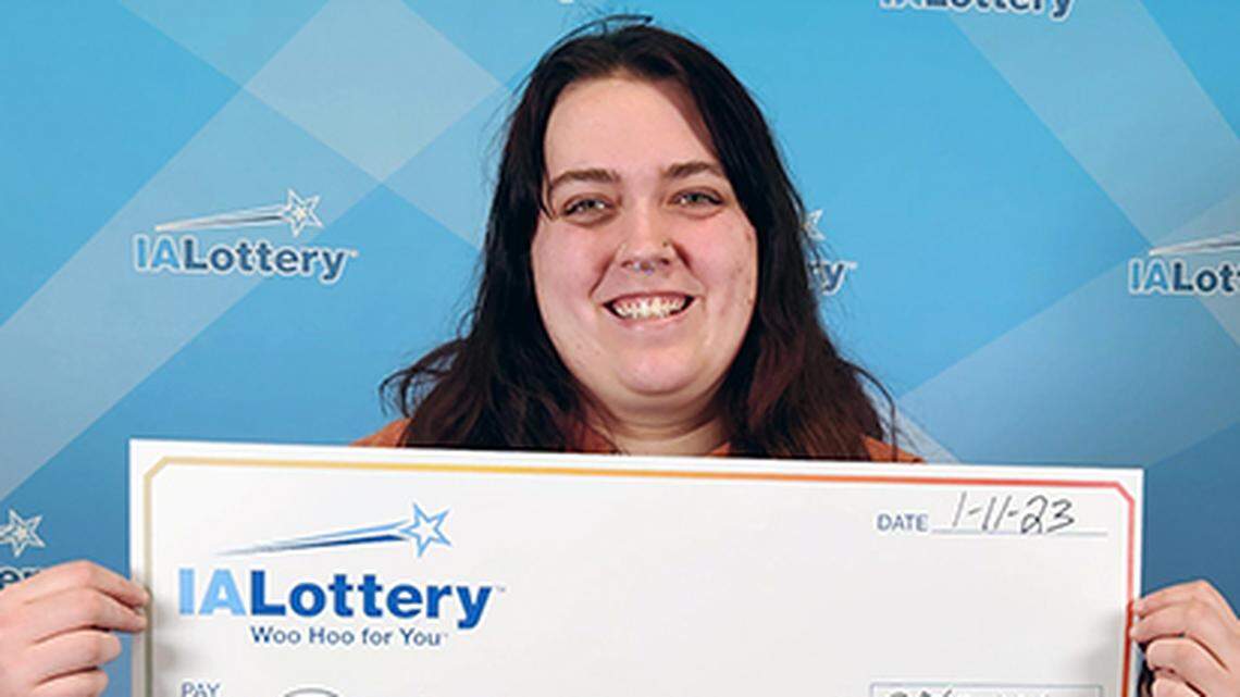 Destiny Lawson, 21, with her $250,000 check.