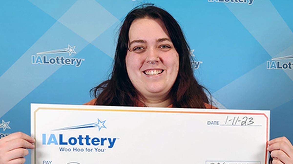 Destiny Lawson, 21, with her $250,000 check.