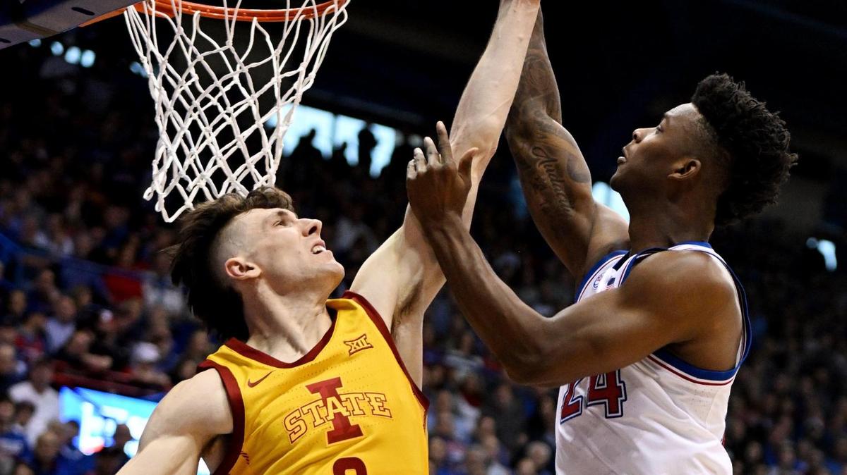 KU’s KJ Adams shoots over Iowa State’s Caleb Grill during the first half of Saturday’s Big 12 Conference game at Allen Fieldhouse on Jan. 14, 2023.