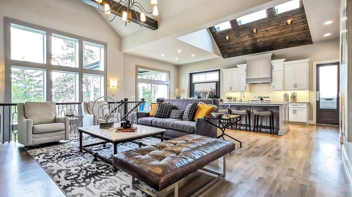 Built by Don Julian Builders and designed by Teri Stolz, the Brookridge II is a reverse 1.5-story, 5-bedroom model, The vaulted ceiling with skylights and tongue-and-groove wood detail is a centerpiece of the well-equipped kitchen. Can be built on select home sites throughout Terrybrook Farms.